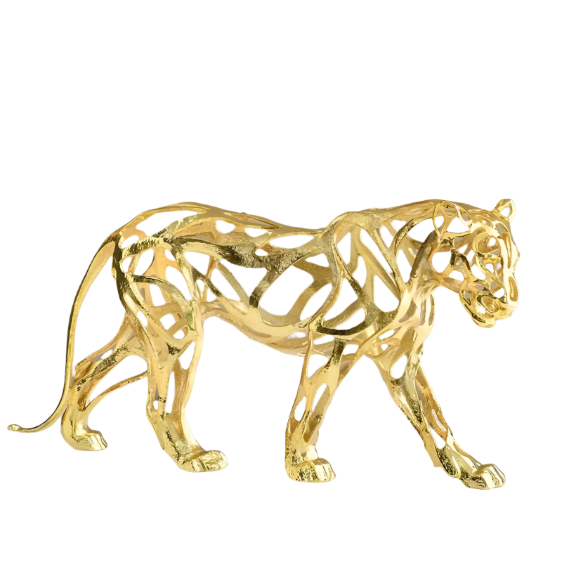 Gold abstract tiger sculpture with a hollow geometric design, elegantly displayed on a white surface against a neutral background.