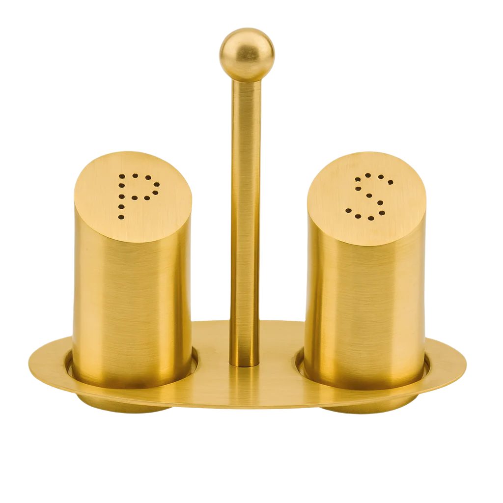 Gold salt and pepper shaker set on a white background
