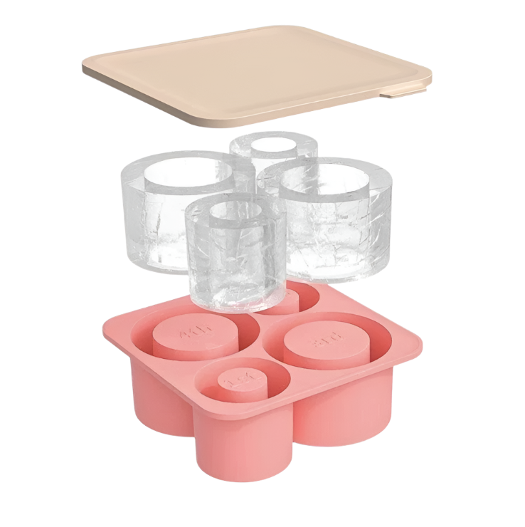 Pink silicone ice cube tray with clear plastic cups on a white background