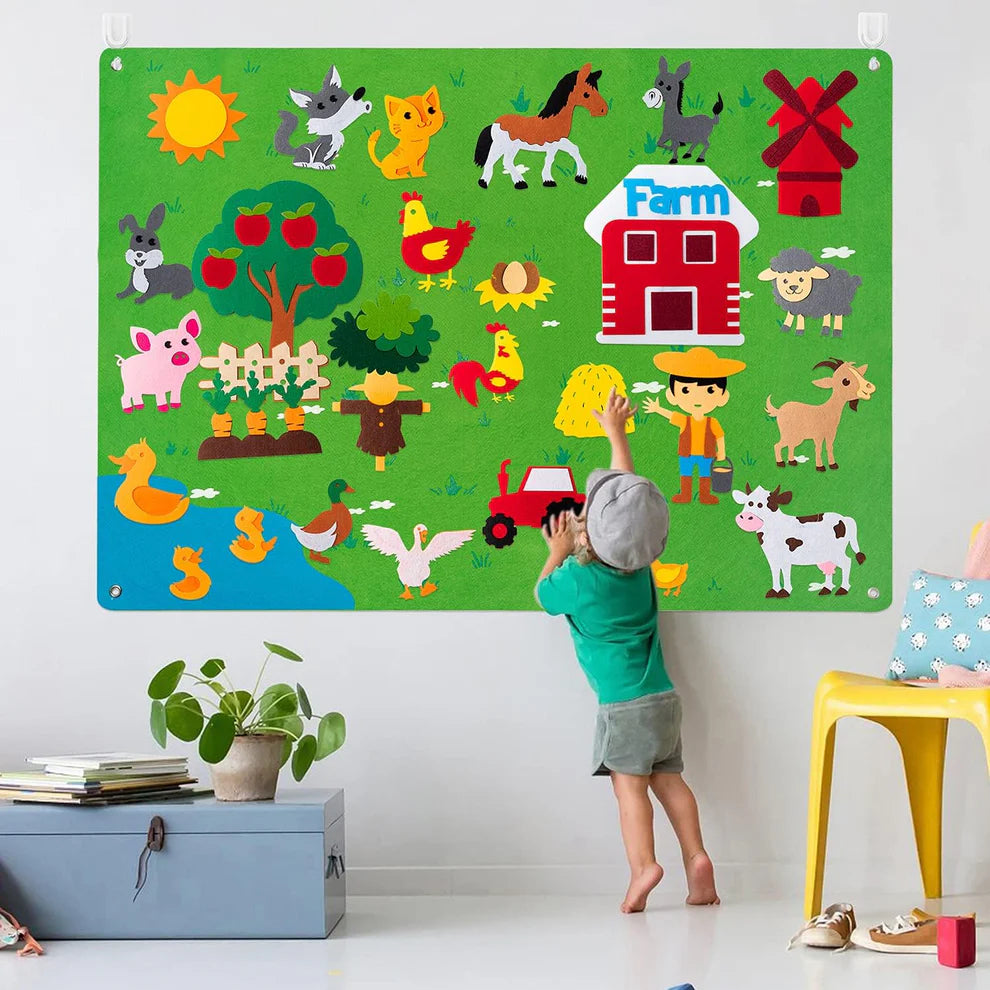 Child interacting with a colorful farm-themed board game on a wall.