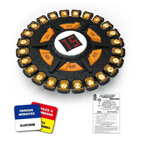 A circular black and orange board game set displayed on a white background, with three small accessory cards or inserts shown below. The main product has a black outer ring with multiple orange segments and a central white hub containing a red digital display.