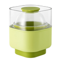 Green kitchen appliance with a clear lid on a white background