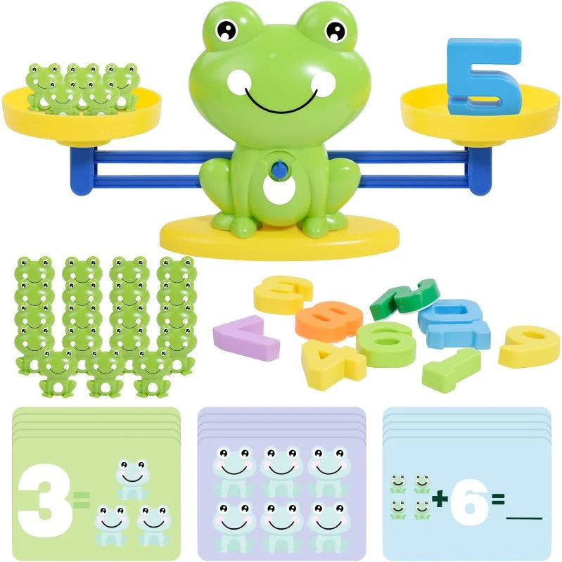 Educational toy set with a frog design, numbers, and shapes on a balance scale.