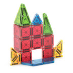 Colorful magnetic building blocks forming a castle-like structure on a white background