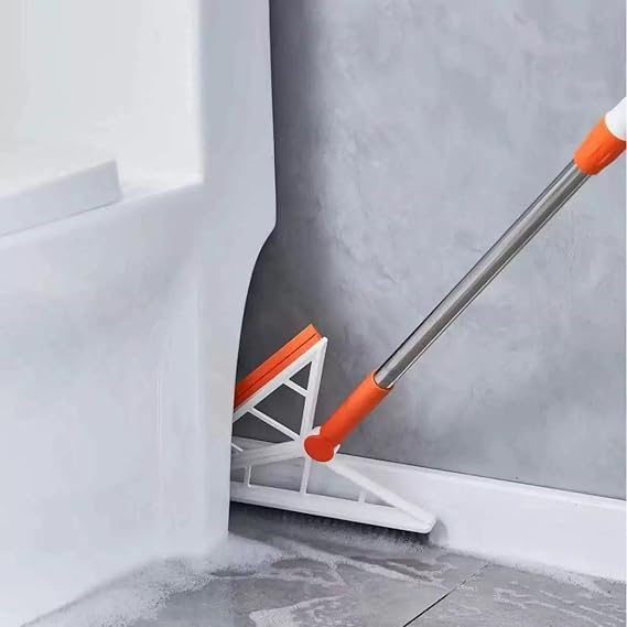 Rotatable mop cleaning under a couch with 360° swivel head.