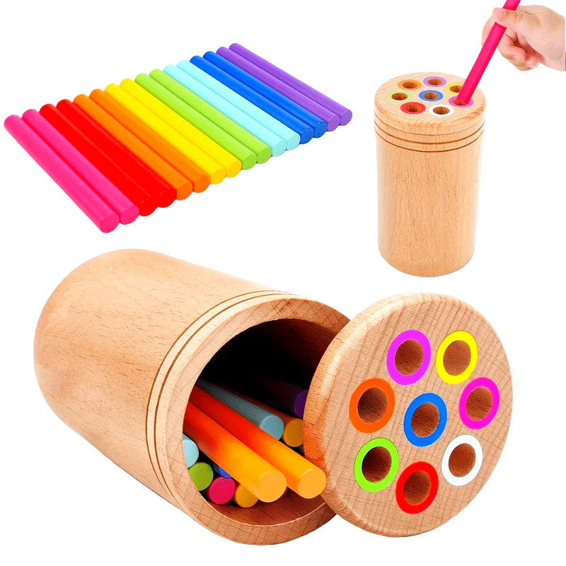Colorful wooden sticks with a wooden container on a white background