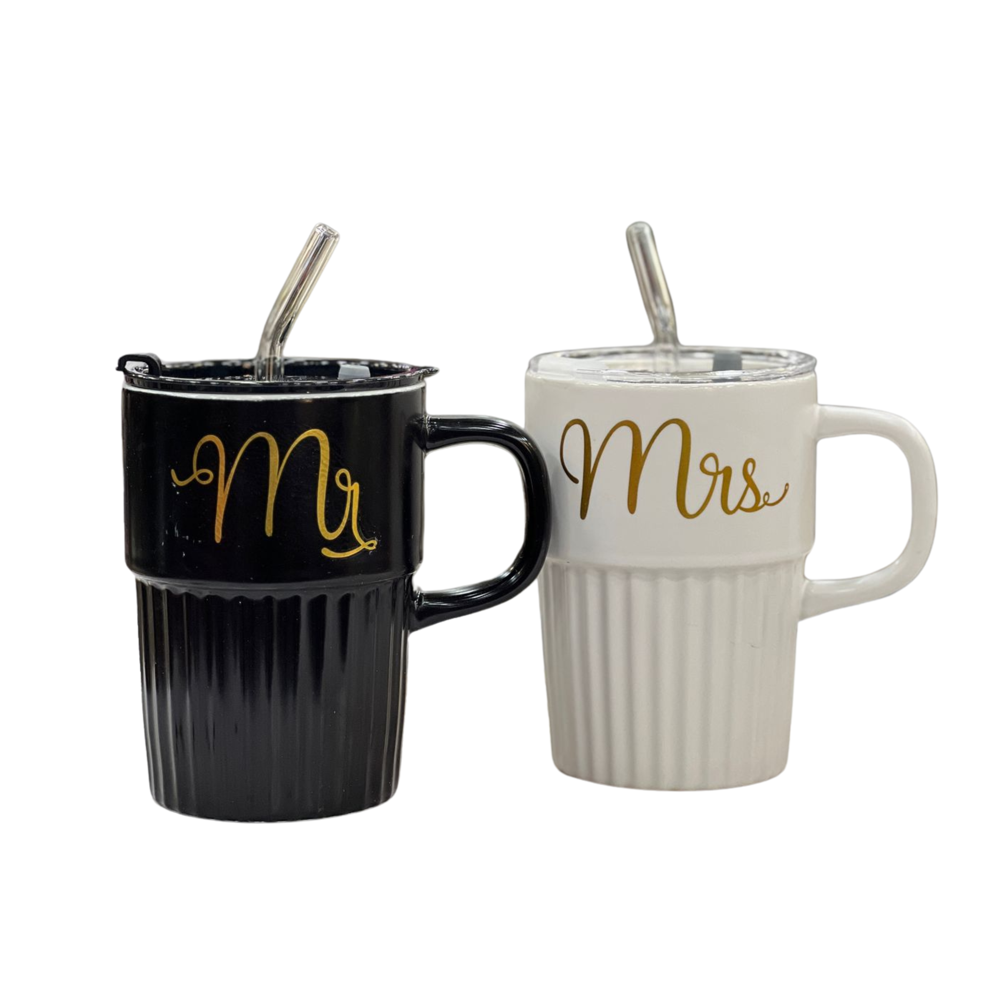 A black ceramic mug with “Mr.” in gold lettering alongside a white ceramic mug with “Mrs.” in gold lettering, each featuring a ridged design, matching lids, and clear straws.