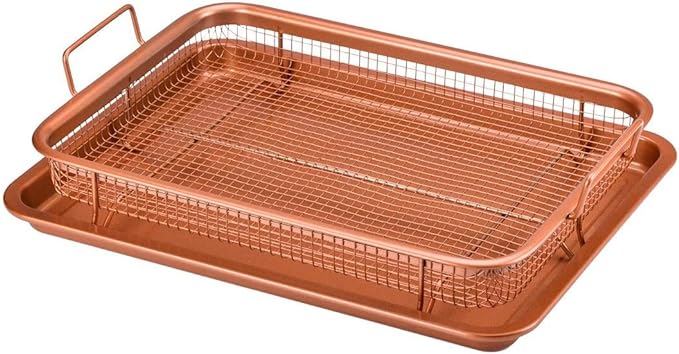 A stylish copper crisper tray with an elevated mesh basket, designed for even cooking and healthier meals. The set includes a non-stick baking tray and plate, perfect for making crispy fries, chicken, and more without added oils.