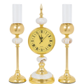 Gold clock with candle holders on a white background