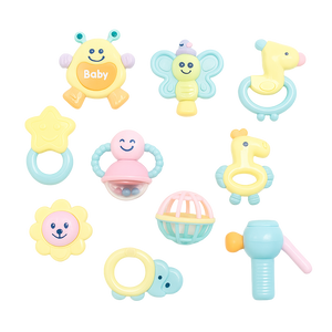 Set of colorful baby toys on a white background