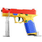 Assembled DIY tactical building block blaster handle toy in black and grey, standing on a white background.