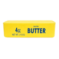 Giant butter stick squishy, 24 cm long, held in two hands with a thumbprint dent slowly rising back out