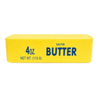 Giant butter stick squishy, 24 cm long, held in two hands with a thumbprint dent slowly rising back out