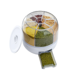 Spice organizer with compartments filled with various spices on a white background