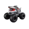 Shark RC monster truck spraying water from its jaws, with off-road tyres and a waterproof 2.4GHz remote