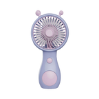 Handheld fan in use outdoors with phone on stand watching a movie.