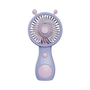 Handheld fan in use outdoors with phone on stand watching a movie.