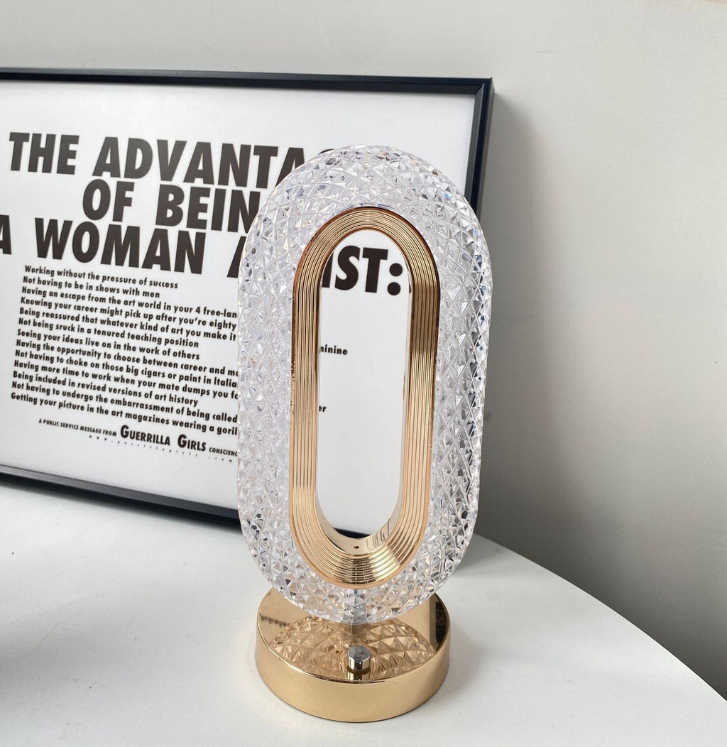 Crystal Table Lamp displaying its sleek design and high-quality materials, including an acrylic lampshade and iron body, with a touch switch for easy light color adjustment.