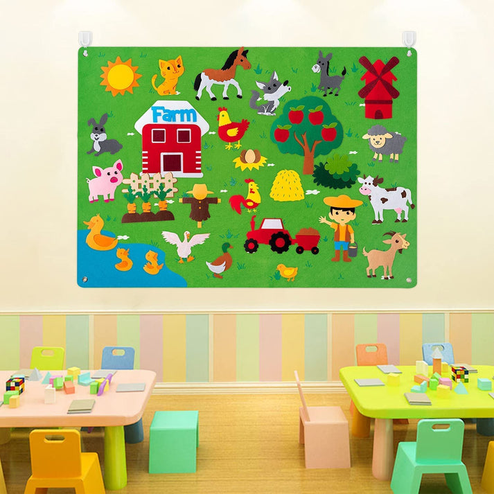Colorful interactive felt board with animal, underwater, farm, and space-themed felt pieces arranged for creative storytelling and sensory play.

