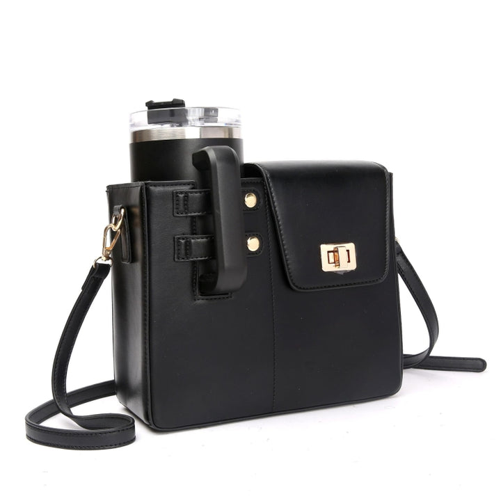 Hands-free crossbody bag worn at a gym with Stanley cup inside.