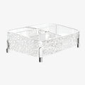Clear decorative tray with silver glitter base on a white background