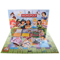 Colorful Disney Princess Monopoly Card Game display featuring beautifully illustrated princess cards arranged on a compact, portable game board.







