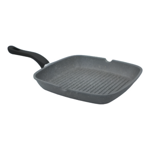 Illa Planeta Grill Pan searing steak with perfect grill marks.